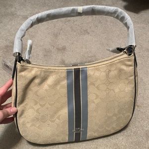 Brand new champagne and blue Coach purse